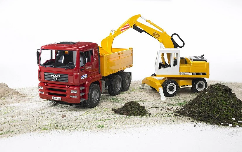 BRUDER MAN TGA CONSTRUCTION TRUCK with EXCAVATOR - Image 3