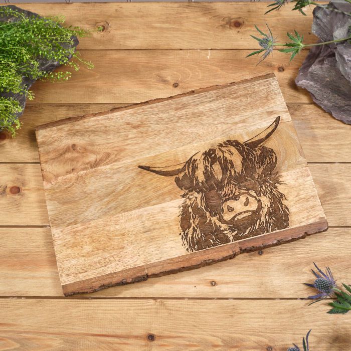RL MANGO WOOD ENGRAVED DECORATIVE HIGHLAND COW BOARD WITH BARK EDGE