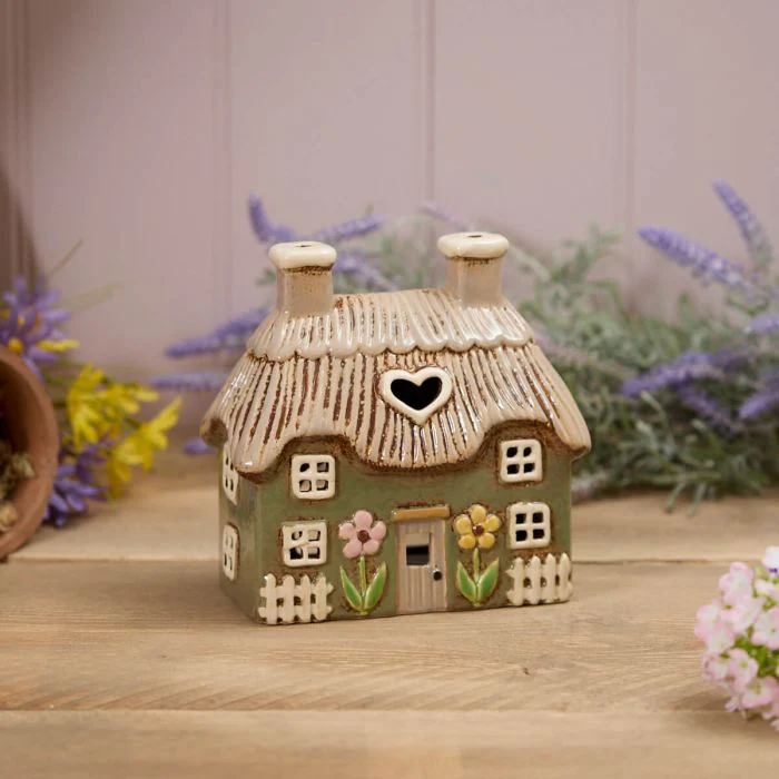 RL STONEWARE GREEN THATCHED COTTAGE WITH EMBOSSED FLOWERS TEA LIGHT HOLDER